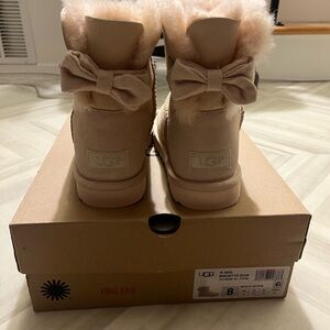 UGG Women's Mini Bow Boot in Chestnut